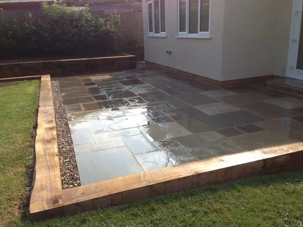 new patio sodden with rain water